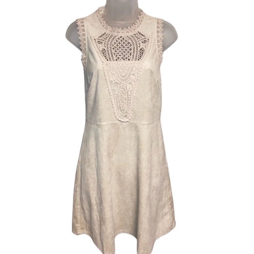 Altar'd State Cream Lace Dress feels and looks like faux leather